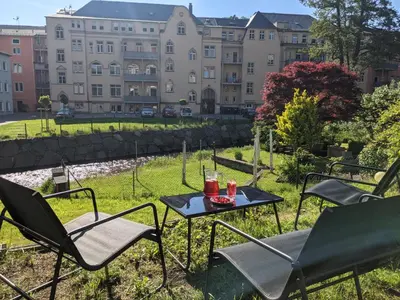 Ein Garten an der Unterkunft HW1B - Urlaubsmagie Gemeinschaftsgarten mit Pool, Sauna & Terrasse