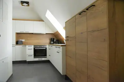 Küche/Küchenzeile in der Unterkunft Buschschänke Lomnitz - Appartements