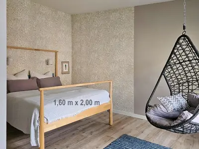 Ein Bett oder Betten in einem Zimmer der Unterkunft Dein Zuhause in der Ferne im grünen Kreativhof 