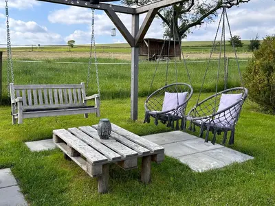 Ein Garten an der Unterkunft Apartment in Papstdorf 