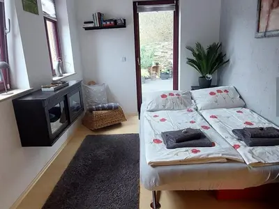 Ein Bett oder Betten in einem Zimmer der Unterkunft Am Rander der Stadt aber Zentrums Nähe