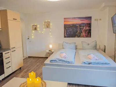 Ein Bett oder Betten in einem Zimmer der Unterkunft B2 - Urlaubsmagie - mit Terrasse& Grill direkt am Wanderweg