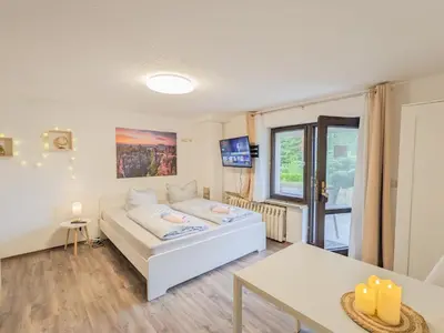 Ein Bett oder Betten in einem Zimmer der Unterkunft B2 - Urlaubsmagie - mit Terrasse& Grill direkt am Wanderweg