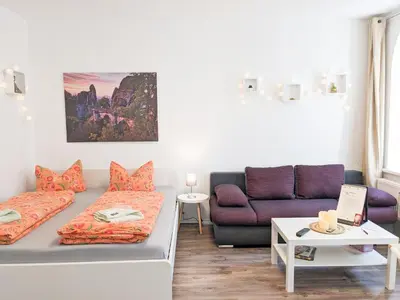 Ein Sitzbereich in der Unterkunft F0 - Urlaubsmagie - Kleine voll ausgestattete Wohnung mit Gemeinschaftsgarten, -pool & -sauna
