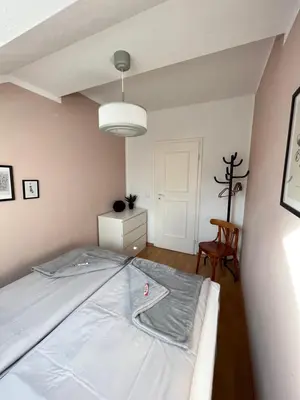 Ein Bett oder Betten in einem Zimmer der Unterkunft K2-Project - Gipfelstürmer - Über den Dächern von Schloßchemnitz