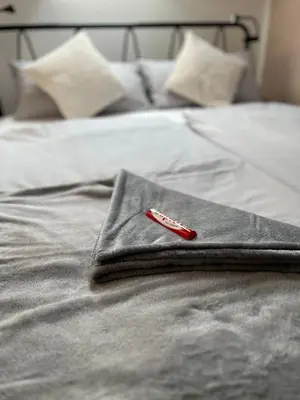 Ein Bett oder Betten in einem Zimmer der Unterkunft K2-Project - Gipfelstürmer - Über den Dächern von Schloßchemnitz