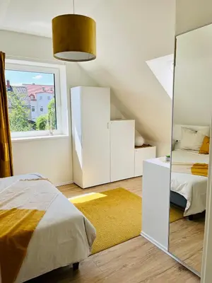 Ein Bett oder Betten in einem Zimmer der Unterkunft 55m2 Chemnitz Rabenstein Kids Welcome, Wifi, Privater Parkplatz, Waschmaschine, Babybett, Klimaanlage