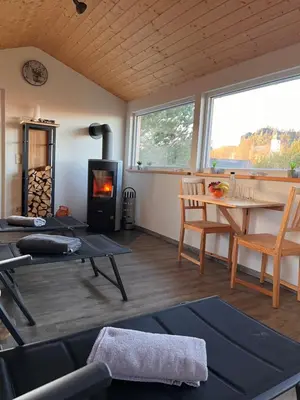 Ein Sitzbereich in der Unterkunft Apartment in Papstdorf 