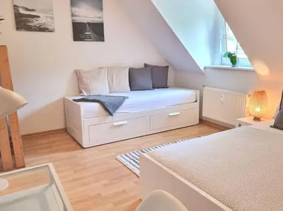 Ein Bett oder Betten in einem Zimmer der Unterkunft 2 room apt at It-district Neustadt & free parking