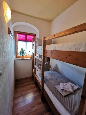 Ein Bett oder Betten in einem Zimmer der Unterkunft Ferienwohnung Kutscherstuben Bauernhaus Vetter