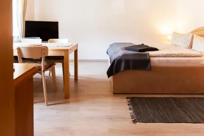 Ein Bett oder Betten in einem Zimmer der Unterkunft Ferienwohnung Elbstübchen