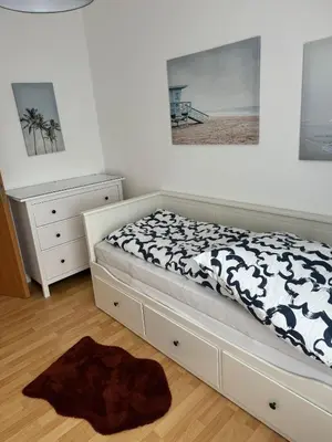 Ein Bett oder Betten in einem Zimmer der Unterkunft Zentrum, 3Zi, 5P, WiFi, Balkon, ruhig
