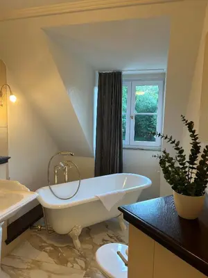 Ein Badezimmer in der Unterkunft Weltemühle Hotel by Miri's Dresden