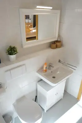 Ein Badezimmer in der Unterkunft Cosy Studio, sunny balcony in It-District Neustadt