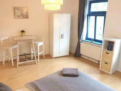 Ein Bett oder Betten in einem Zimmer der Unterkunft Studio in It District Neustadt Louisenstraße
