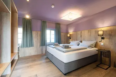 Ein Bett oder Betten in einem Zimmer der Unterkunft Ranunkelhof