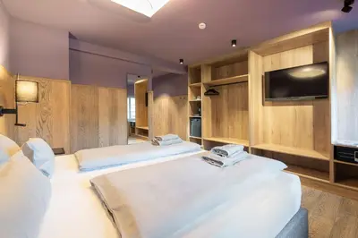 Ein Bett oder Betten in einem Zimmer der Unterkunft Ranunkelhof