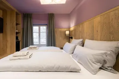 Ein Bett oder Betten in einem Zimmer der Unterkunft Ranunkelhof