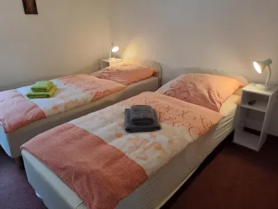 Ein Bett oder Betten in einem Zimmer der Unterkunft Ferienwohnung Hänsch