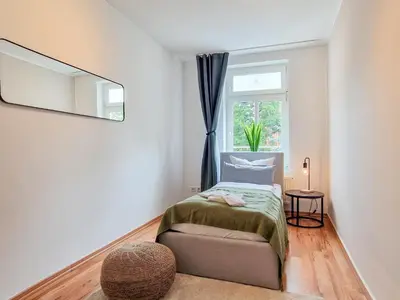 Ein Bett oder Betten in einem Zimmer der Unterkunft RR - Apartments Kappel - 85qm - Lift - WIFI