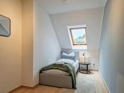 Ein Bett oder Betten in einem Zimmer der Unterkunft RR - Apartments Kappel - 85qm - Lift - WIFI