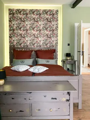 Ein Bett oder Betten in einem Zimmer der Unterkunft Zur Alten Schneiderei Kamenz
