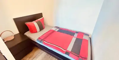 Ein Bett oder Betten in einem Zimmer der Unterkunft Richter Apartments Finsterwalde 4