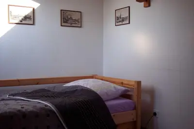 Ein Bett oder Betten in einem Zimmer der Unterkunft Gästezimmer Charlotte