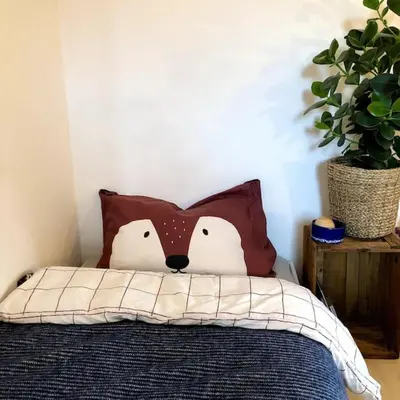 Ein Bett oder Betten in einem Zimmer der Unterkunft Happy Fuchsbau Ferienwohnung
