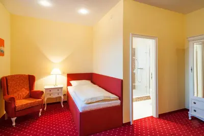 Ein Bett oder Betten in einem Zimmer der Unterkunft Quartier Rautenstock GbR