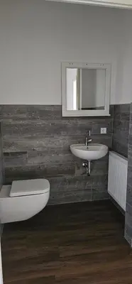 Ein Badezimmer in der Unterkunft SeenSucht & Urlaubsträume, Ferienwohnung 