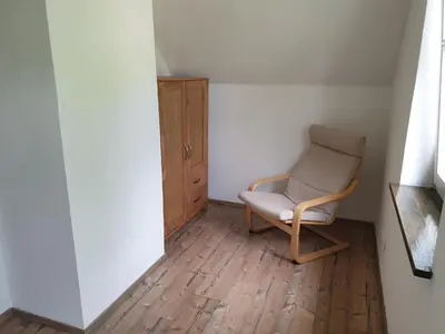Ein Sitzbereich in der Unterkunft Altes Forsthaus Laubusch