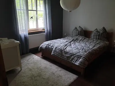 Ein Bett oder Betten in einem Zimmer der Unterkunft Altes Forsthaus Laubusch