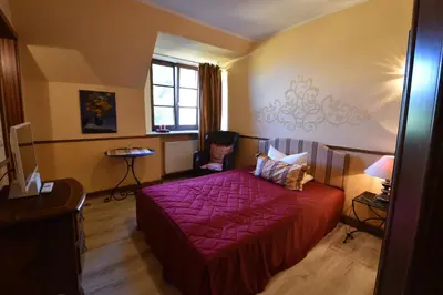 Ein Bett oder Betten in einem Zimmer der Unterkunft Pension zur Königlichen Ausspanne Dresden