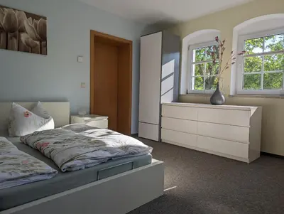 Ein Bett oder Betten in einem Zimmer der Unterkunft Ferienwohnung grünes Haus Colditz