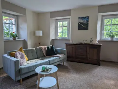 Ein Sitzbereich in der Unterkunft Ferienwohnung grünes Haus Colditz