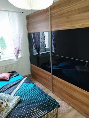 Ein Bett oder Betten in einem Zimmer der Unterkunft Ferienwohnung Einsiedel