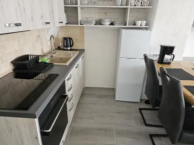 Küche/Küchenzeile in der Unterkunft Ferienwohnung Gräfin Cosel