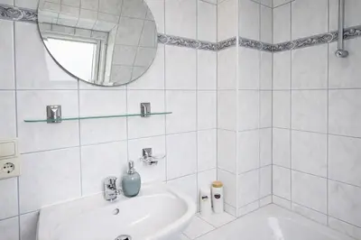 Ein Badezimmer in der Unterkunft B8 Urlaubsmagie Bergsteigerwohnung mit Balkon mit Aussicht aufs Elbsandsteingebirge