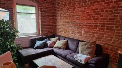 Ein Sitzbereich in der Unterkunft Ferienwohnung Winternest
