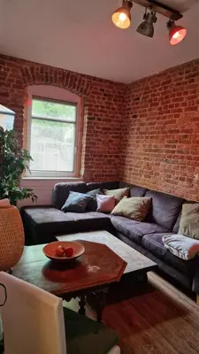 Ein Sitzbereich in der Unterkunft Ferienwohnung Winternest