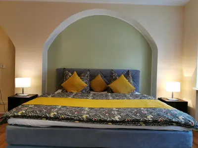 Ein Bett oder Betten in einem Zimmer der Unterkunft Ferienwohnung Schloßblick mit Parkplatz