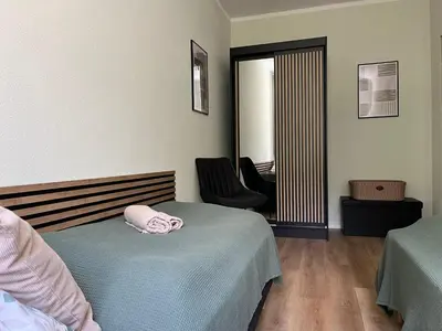 Ein Bett oder Betten in einem Zimmer der Unterkunft Ferienwohnung Leubnitz