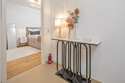 Ein Bett oder Betten in einem Zimmer der Unterkunft Ruhige 5 Sterne Wohnung Nähe Altstadt