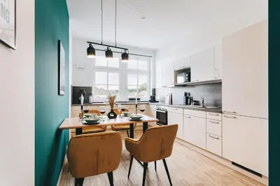 Küche/Küchenzeile in der Unterkunft Oasis Appart - Wohnen in Dresden - Netflix - Tiefgarage - Dachterrasse