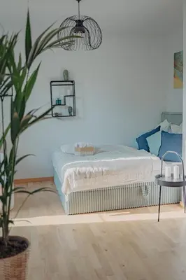 Ein Bett oder Betten in einem Zimmer der Unterkunft Neue Wohnung im Zentrum