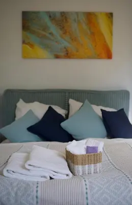 Ein Bett oder Betten in einem Zimmer der Unterkunft Neue Wohnung im Zentrum