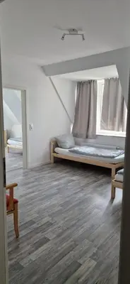 Ein Bett oder Betten in einem Zimmer der Unterkunft Ausblick Freital 2
