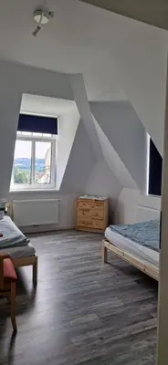 Ein Bett oder Betten in einem Zimmer der Unterkunft Ausblick Freital 2