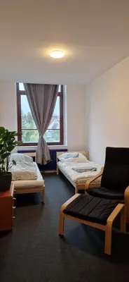 Ein Bett oder Betten in einem Zimmer der Unterkunft Ausblick Freital 3
